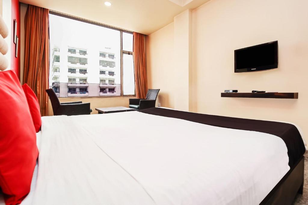 TV a/nebo společenská místnost v ubytování Hotel O Garden View