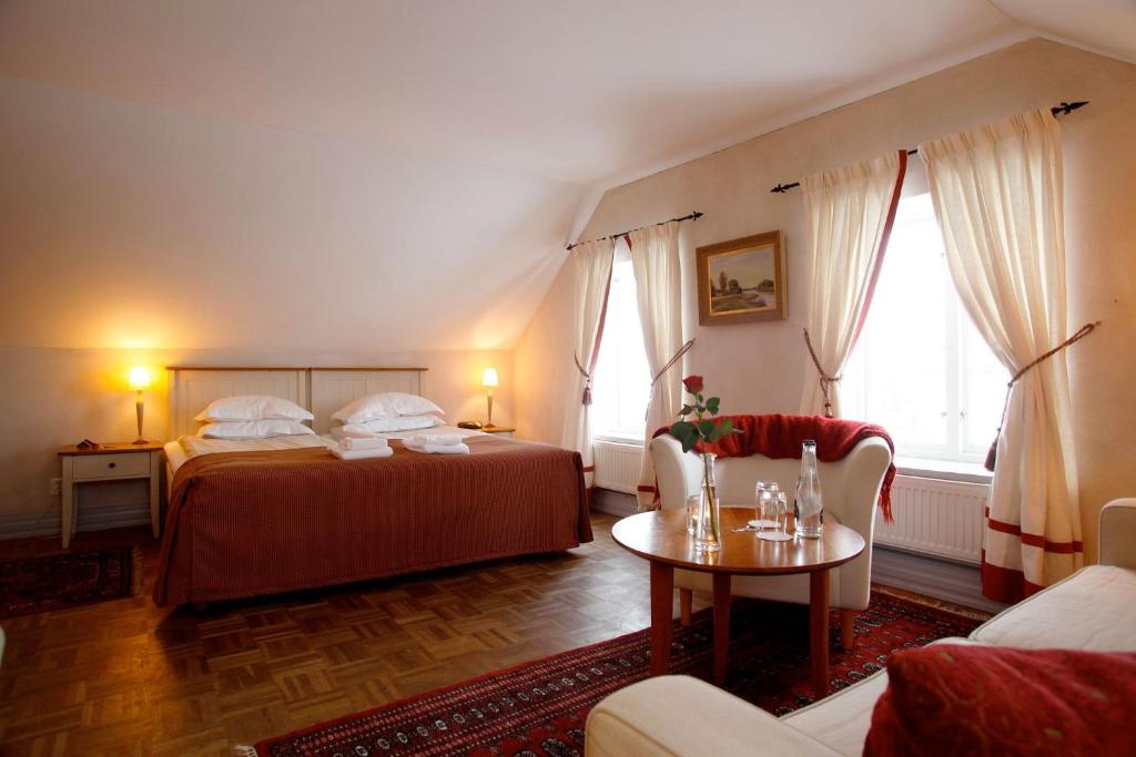 Postel nebo postele na pokoji v ubytování Hotell Gässlingen