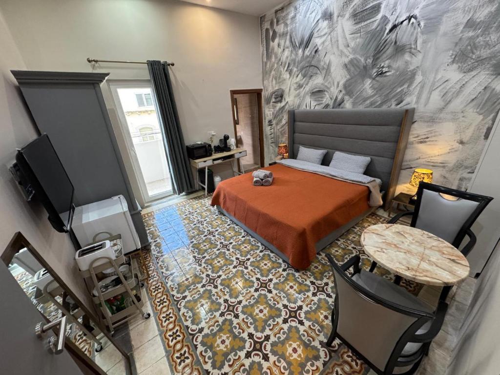 TV a/nebo společenská místnost v ubytování MH Sliema by Malta Holidays