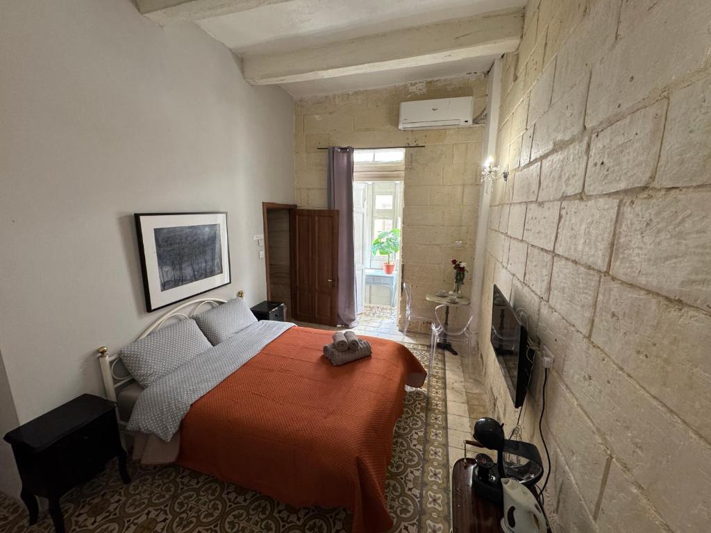 TV a/nebo společenská místnost v ubytování MH Sliema by Malta Holidays