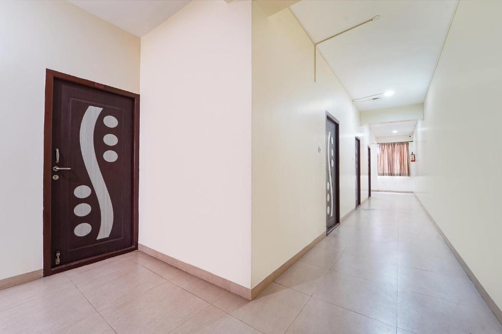 Fotografie z fotogalerie ubytování FabHotel Mani's Residency - Nr Coimbatore International Airport v destinaci Kójamputtúr