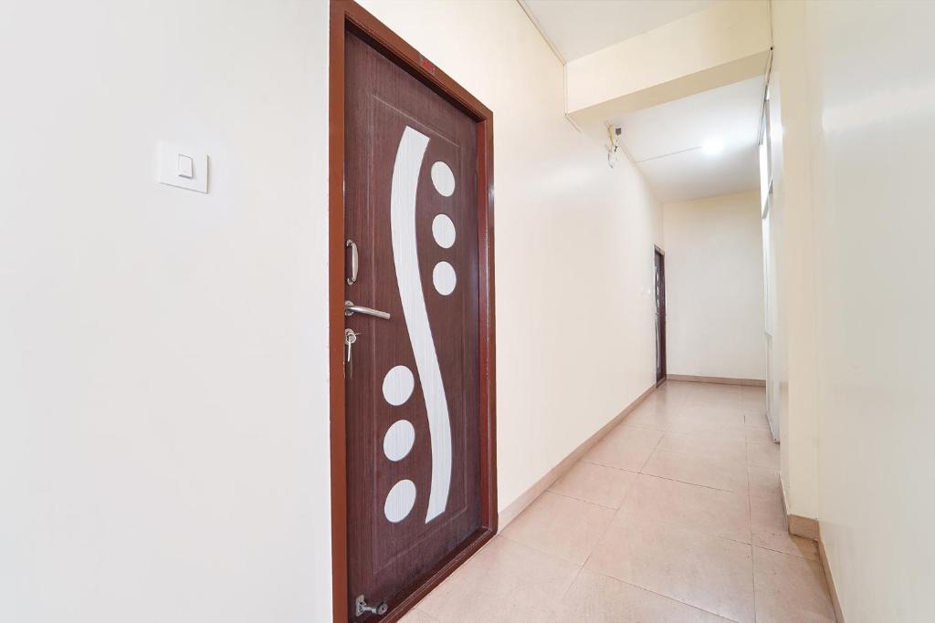 Fotografie z fotogalerie ubytování FabHotel Mani's Residency - Nr Coimbatore International Airport v destinaci Kójamputtúr