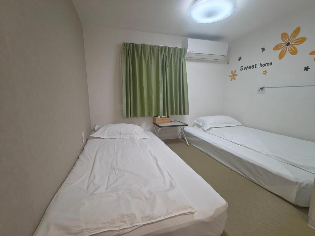 Postel nebo postele na pokoji v ubytování da inn