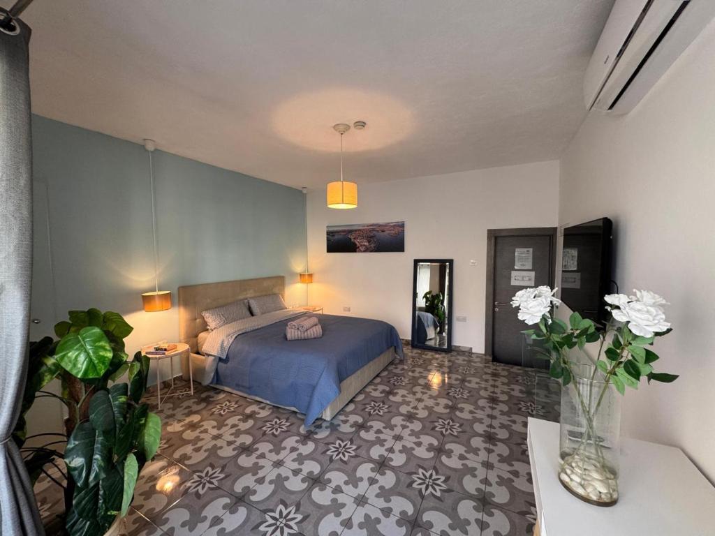 Postel nebo postele na pokoji v ubytování MH Sliema by Malta Holidays