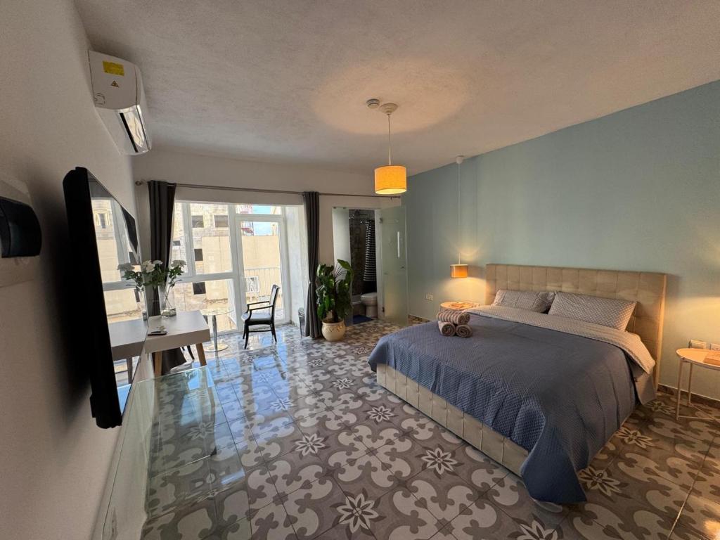 Postel nebo postele na pokoji v ubytování MH Sliema by Malta Holidays