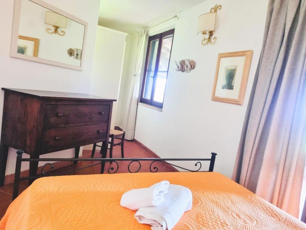 Postel nebo postele na pokoji v ubytování Agriturismo TERRANERA