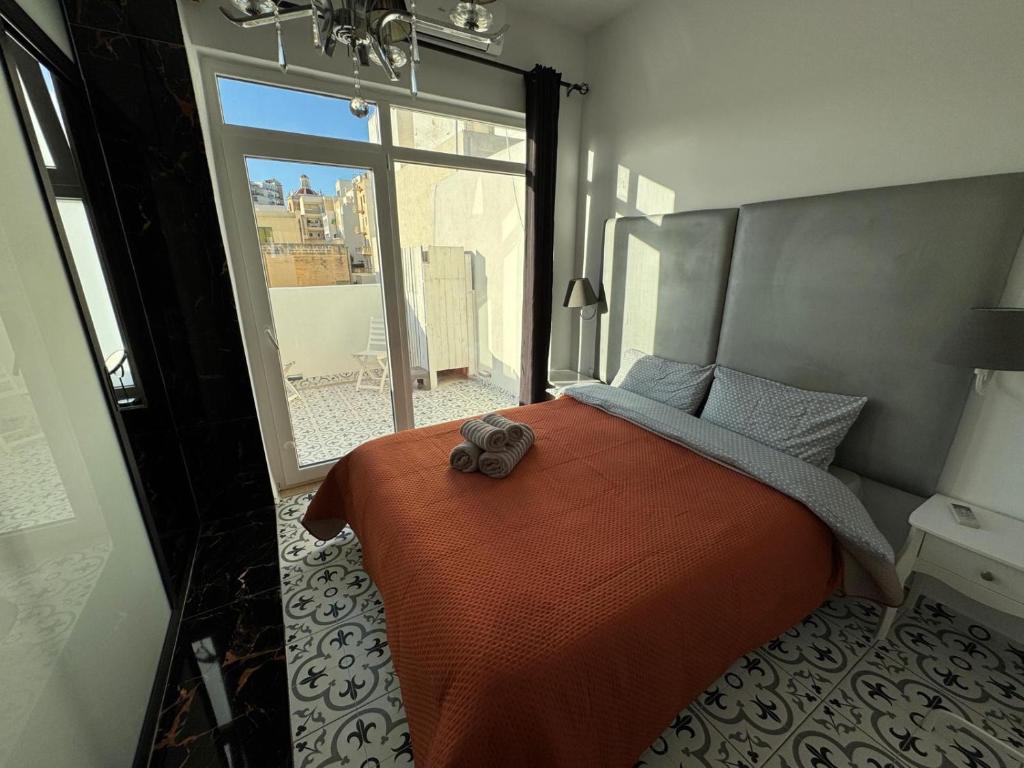 Postel nebo postele na pokoji v ubytování MH Sliema by Malta Holidays