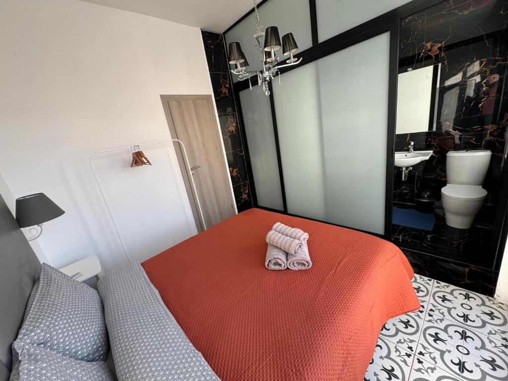 Postel nebo postele na pokoji v ubytování MH Sliema by Malta Holidays