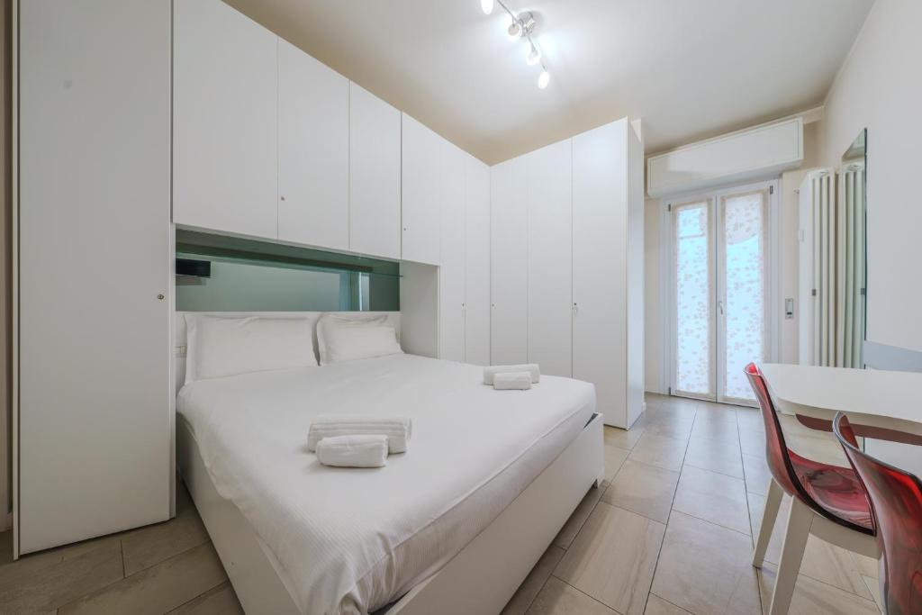 Postel nebo postele na pokoji v ubytování Cristel Apartment - 15 min da Milano