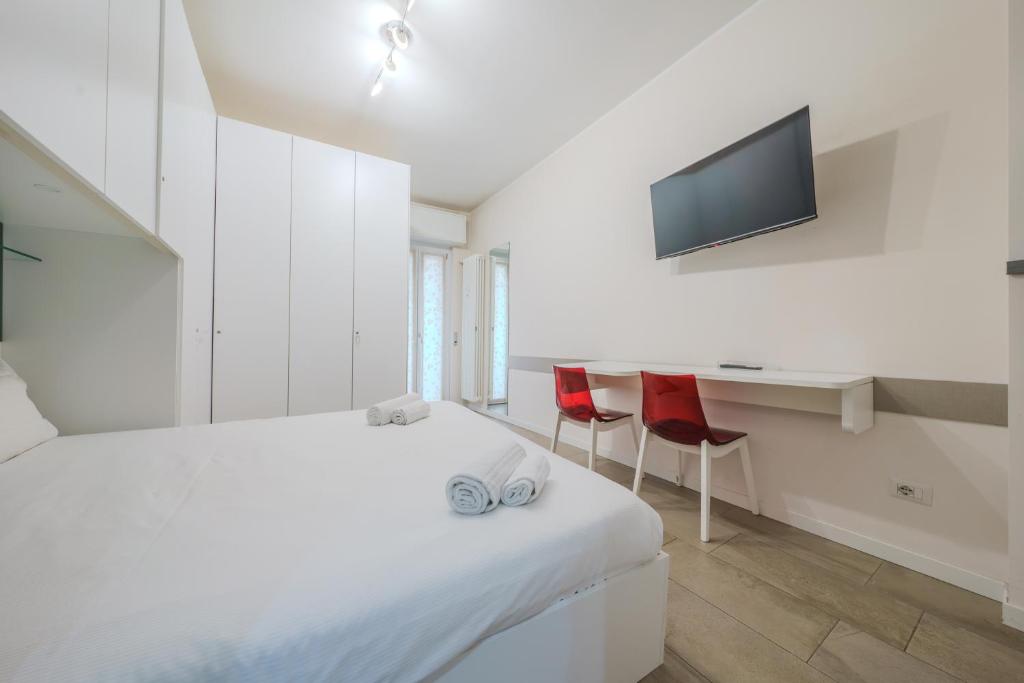 Postel nebo postele na pokoji v ubytování Cristel Apartment - 15 min da Milano