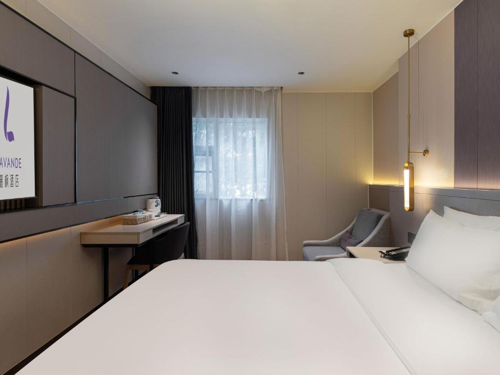 Postel nebo postele na pokoji v ubytování Lavande International Hotel Guangzhou US Consulate General Guangzhou Grandview Plaza Branch - Free Shuttle Bus to Canton Fair Complex During Canton Fair Period & Free VPN Internet Access