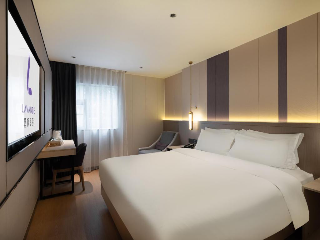 Postel nebo postele na pokoji v ubytování Lavande International Hotel Guangzhou US Consulate General Guangzhou Grandview Plaza Branch - Free Shuttle Bus to Canton Fair Complex During Canton Fair Period & Free VPN Internet Access
