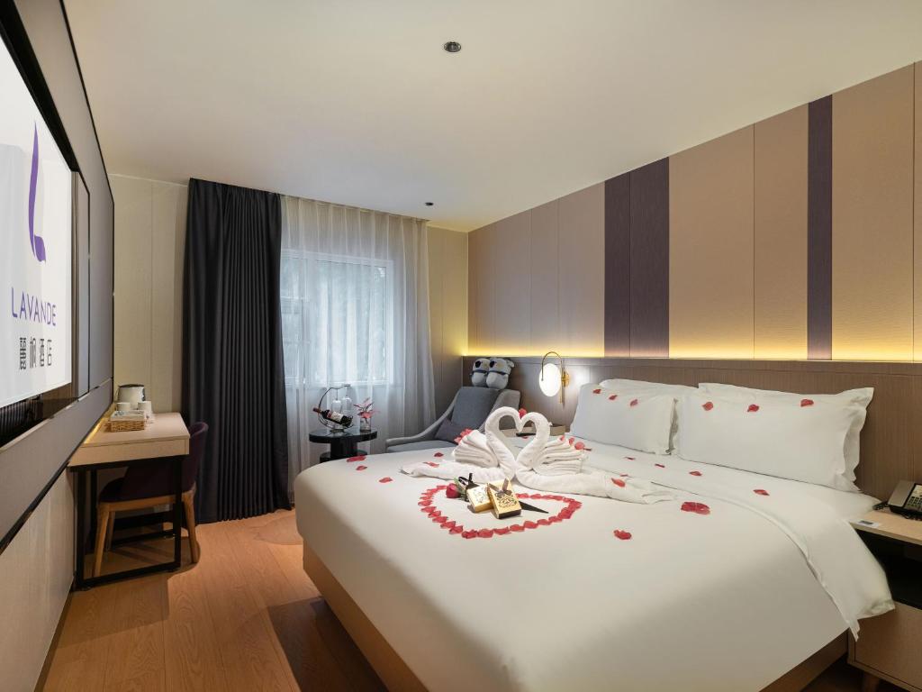 Postel nebo postele na pokoji v ubytování Lavande International Hotel Guangzhou US Consulate General Guangzhou Grandview Plaza Branch - Free Shuttle Bus to Canton Fair Complex During Canton Fair Period & Free VPN Internet Access