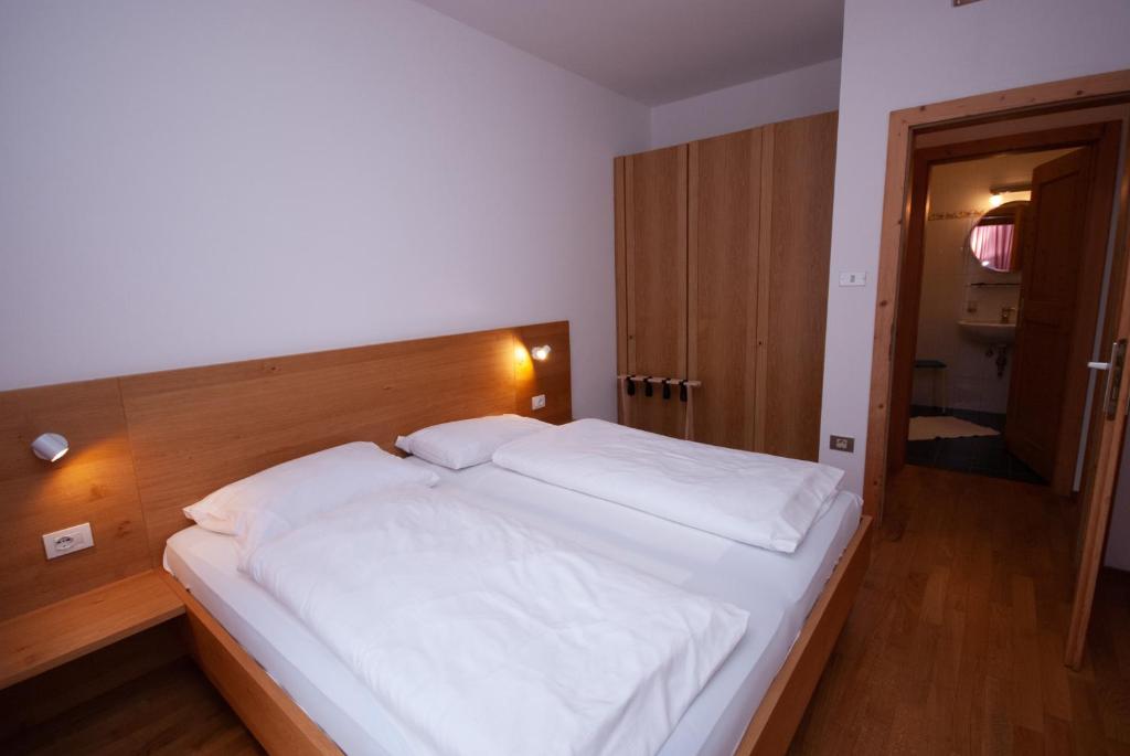 Postel nebo postele na pokoji v ubytování Garni Hofer