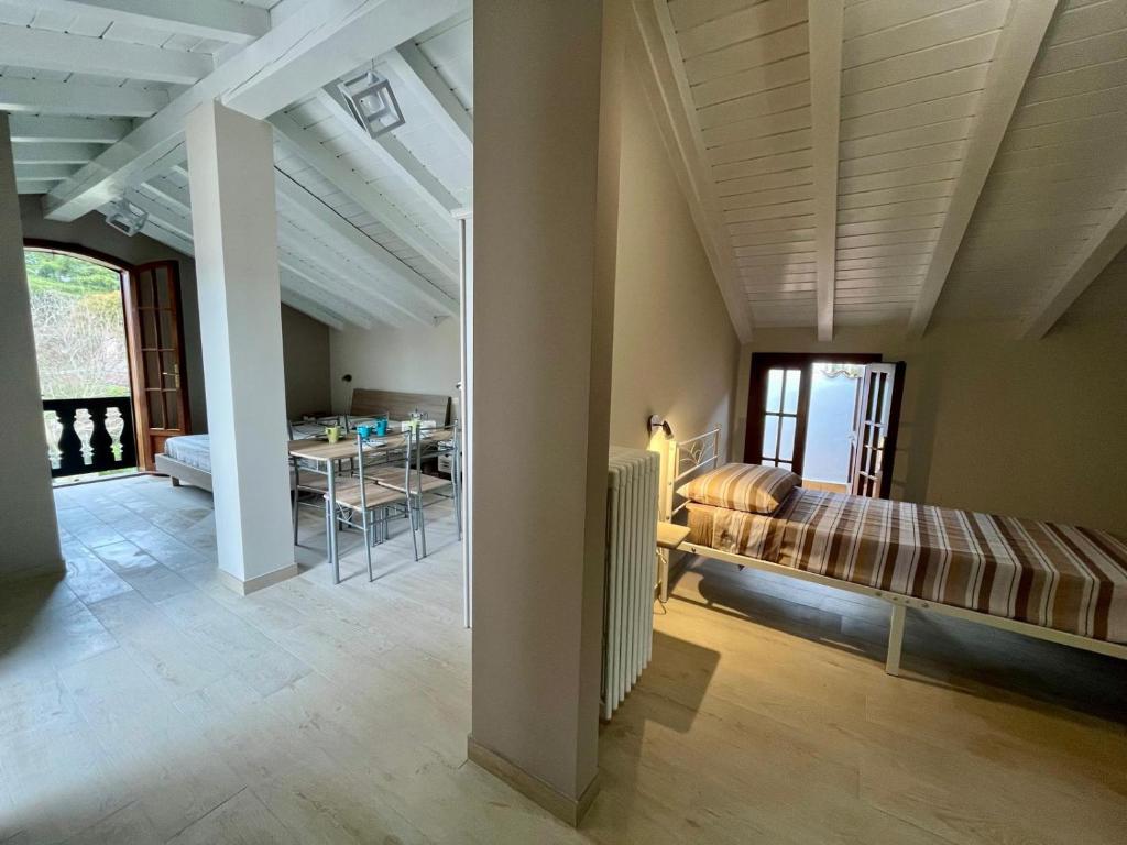 Postel nebo postele na pokoji v ubytování B&B Aria Di Lago