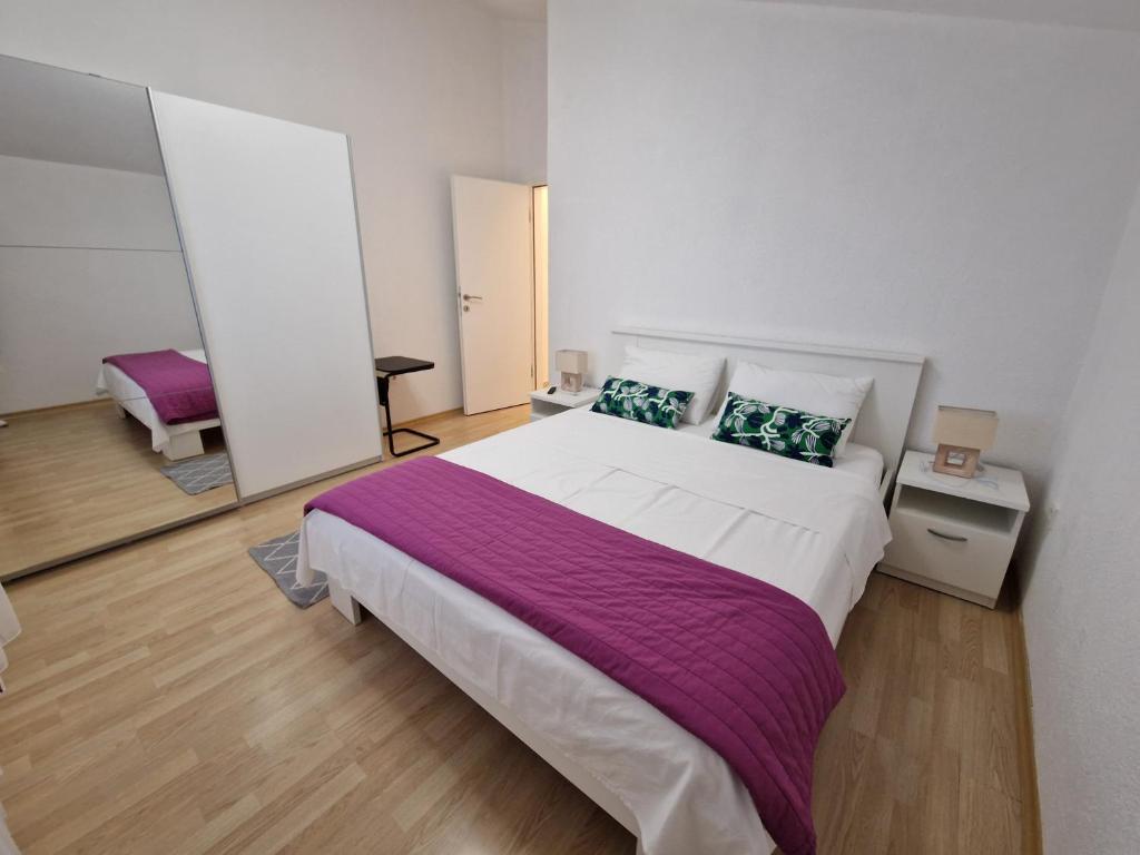 Postel nebo postele na pokoji v ubytování Apartment Hramina