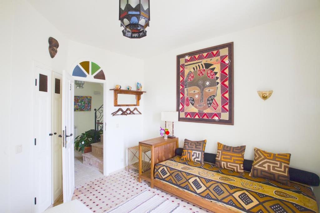 Postel nebo postele na pokoji v ubytování Kasbah Rose
