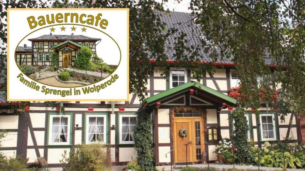 a building with a sign in front of it at Bauerncafé Sprengel in Bad Gandersheim