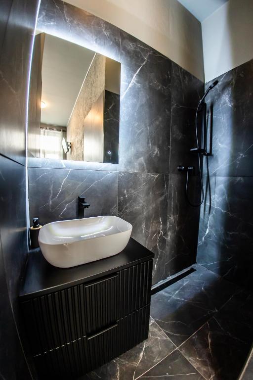Koupelna v ubytování Wellness Rooms Central
