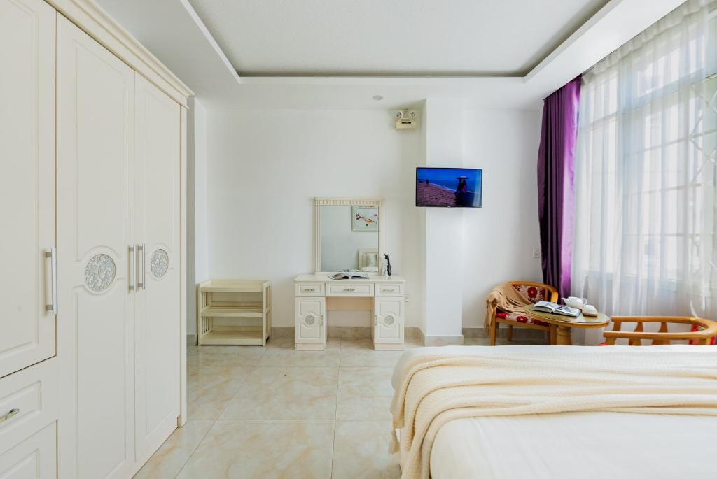 Postel nebo postele na pokoji v ubytování AM Memory Central Hotel 2
