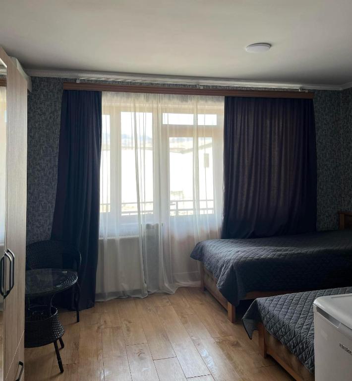 Postel nebo postele na pokoji v ubytování Art Palace