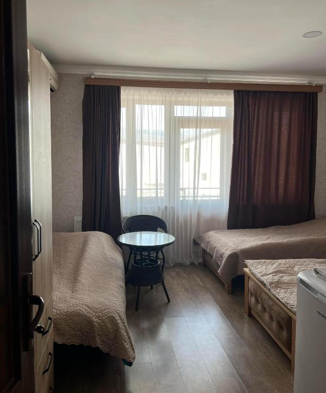 Postel nebo postele na pokoji v ubytování Art Palace