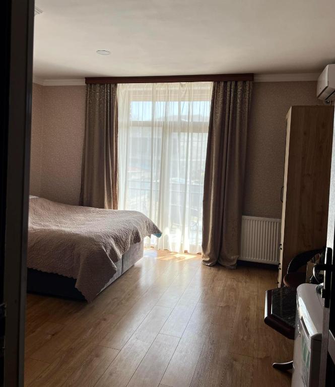 Postel nebo postele na pokoji v ubytování Art Palace