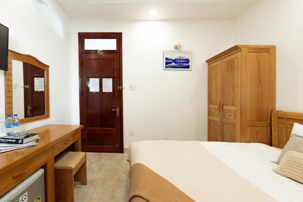 Giường trong phòng chung tại AM Memory Central Hotel 2