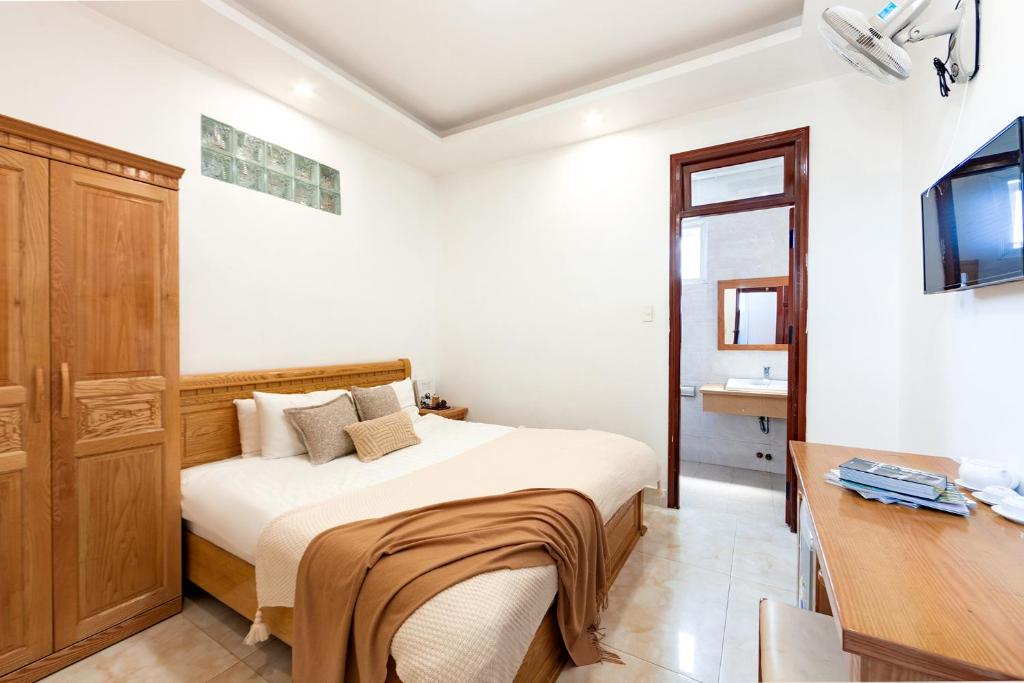 Giường trong phòng chung tại AM Memory Central Hotel 2