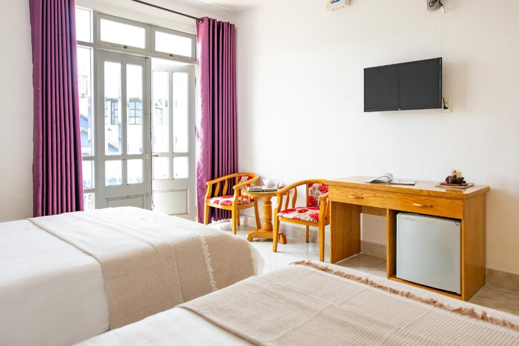 TV a/nebo společenská místnost v ubytování AM Memory Central Hotel 2