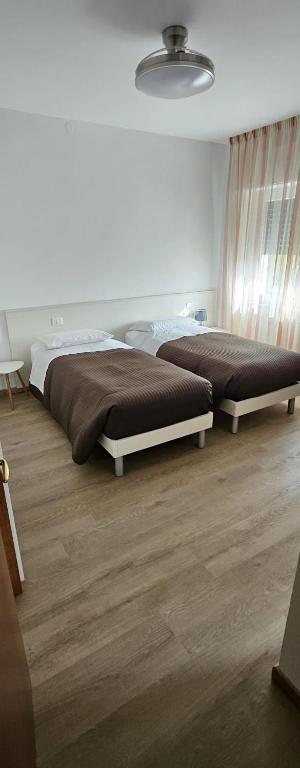 Postel nebo postele na pokoji v ubytování l'igloo b&b