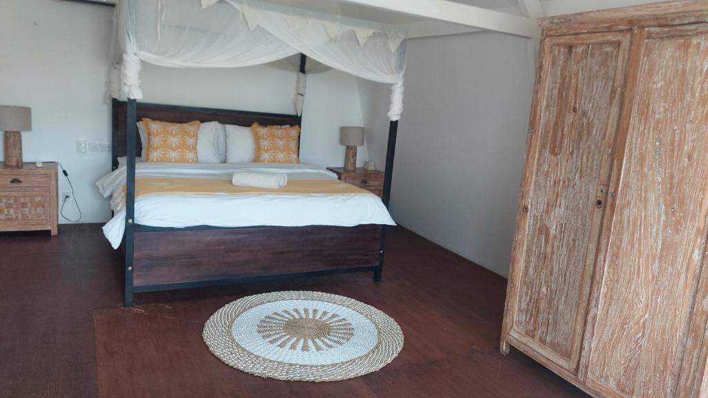 Ένα ή περισσότερα κρεβάτια σε δωμάτιο στο Villa Olivia