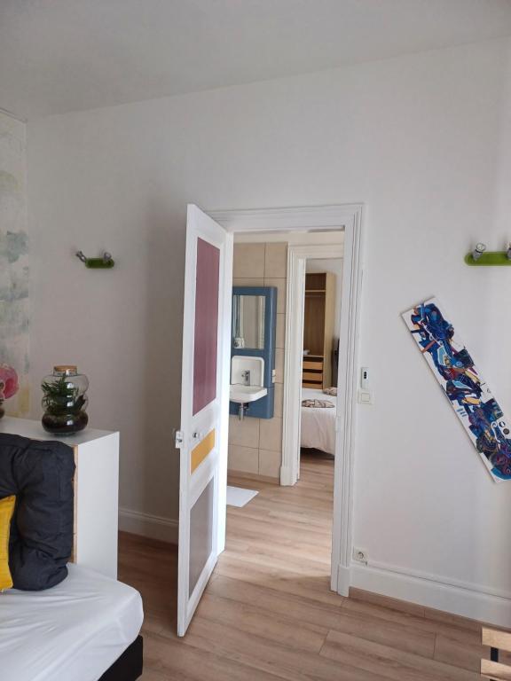 Postel nebo postele na pokoji v ubytování Chambre D'hôtes Les Epicuriens