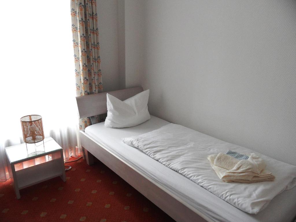 Postel nebo postele na pokoji v ubytování Haus Buchenhof