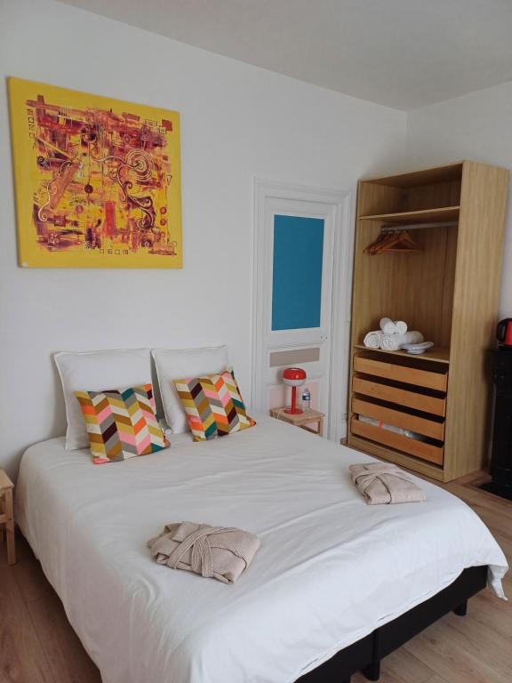 Postel nebo postele na pokoji v ubytování Chambre D'hôtes Les Epicuriens
