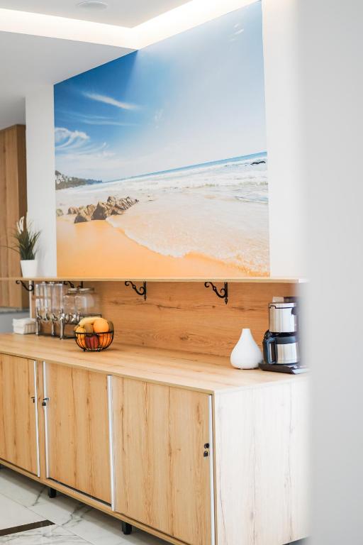 Kuchyň nebo kuchyňský kout v ubytování Relax Mea Hotel
