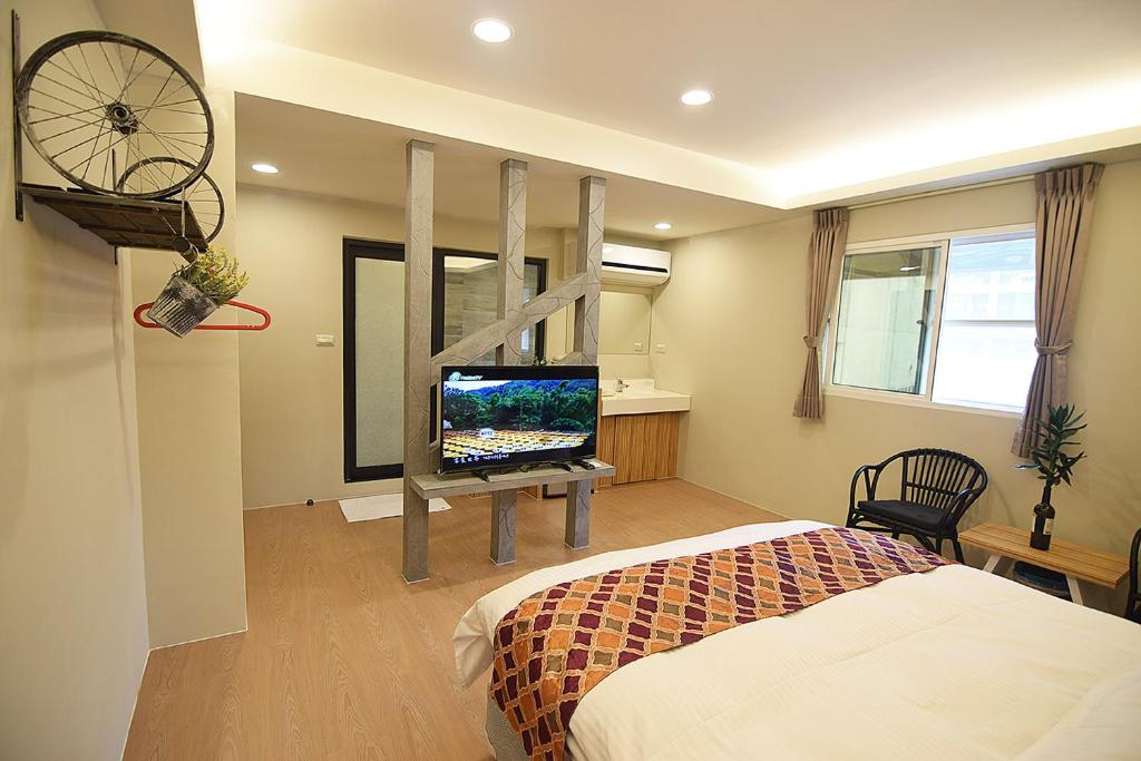 TV a/nebo společenská místnost v ubytování No. 21 Jiaoxi Hot Spring Homestay
