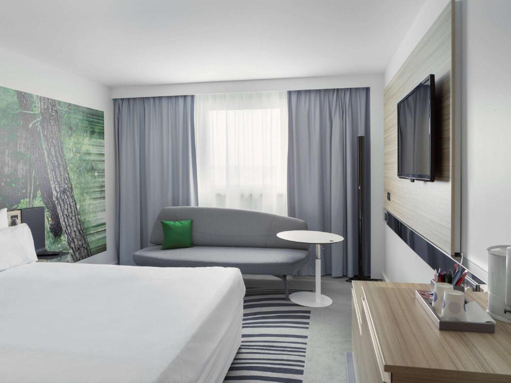 Postel nebo postele na pokoji v ubytování Novotel Paris Charles de Gaulle Airport