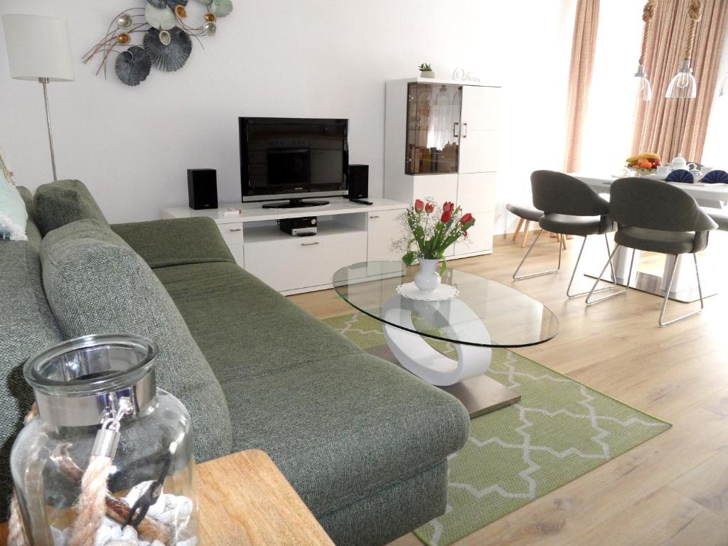 TV a/nebo společenská místnost v ubytování Haus Buchenhof