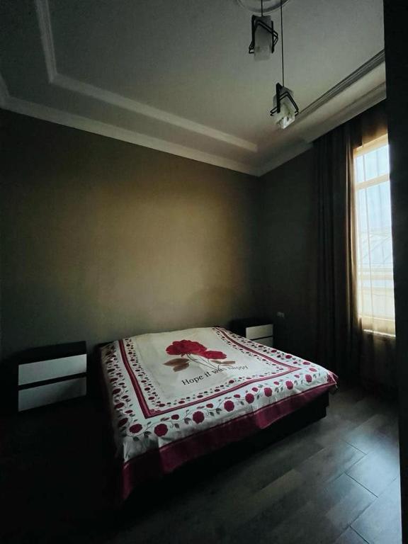 Postel nebo postele na pokoji v ubytování Guest House ZUGDIDI INN
