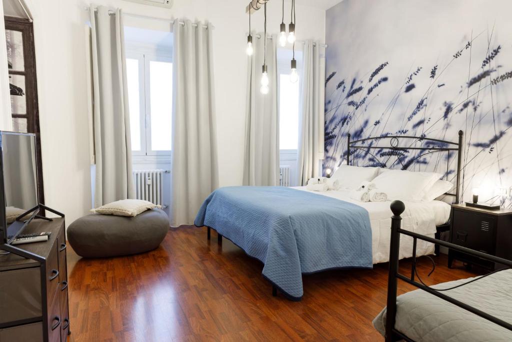 Posteľ alebo postele v izbe v ubytovaní appartamento al centro di Roma Bosuiterome