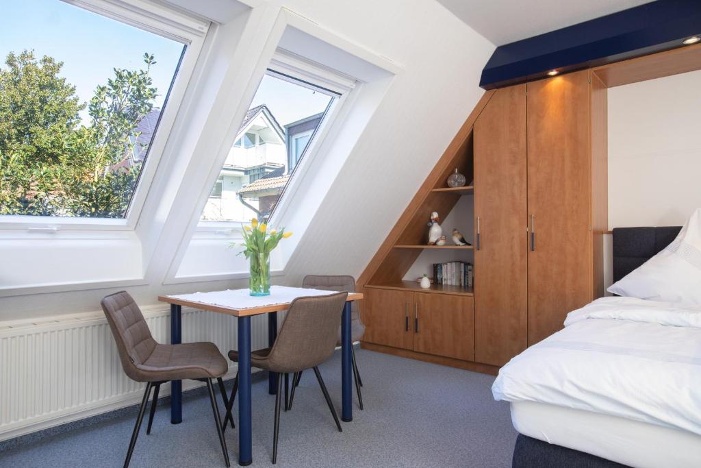 Postel nebo postele na pokoji v ubytování Haus Insa 143 - Ferienwohnung 3