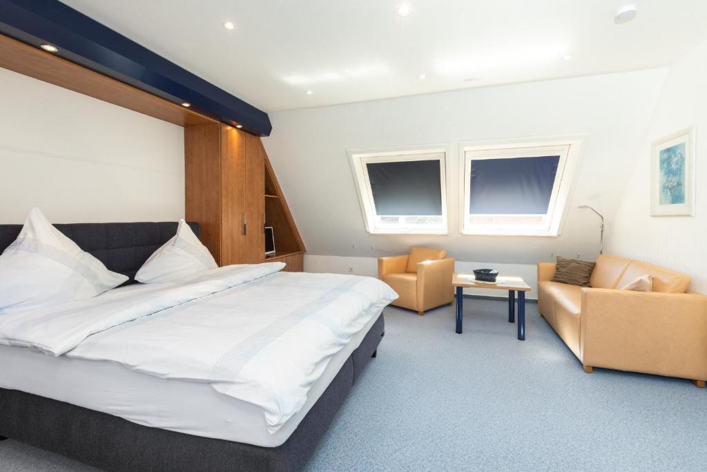 Postel nebo postele na pokoji v ubytování Haus Insa 143 - Ferienwohnung 3