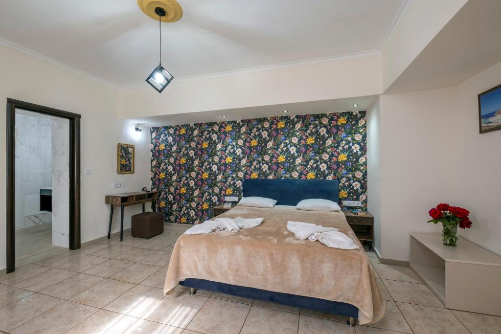Posteľ alebo postele v izbe v ubytovaní Areti Suites