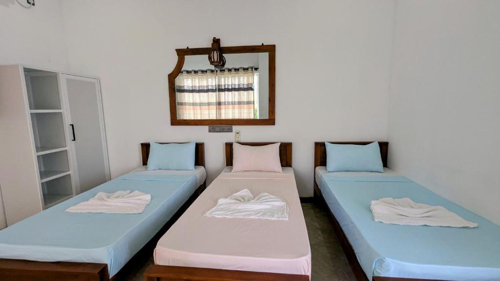 Postel nebo postele na pokoji v ubytování Skyy Villa matara