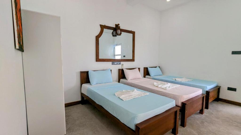 Postel nebo postele na pokoji v ubytování Skyy Villa matara