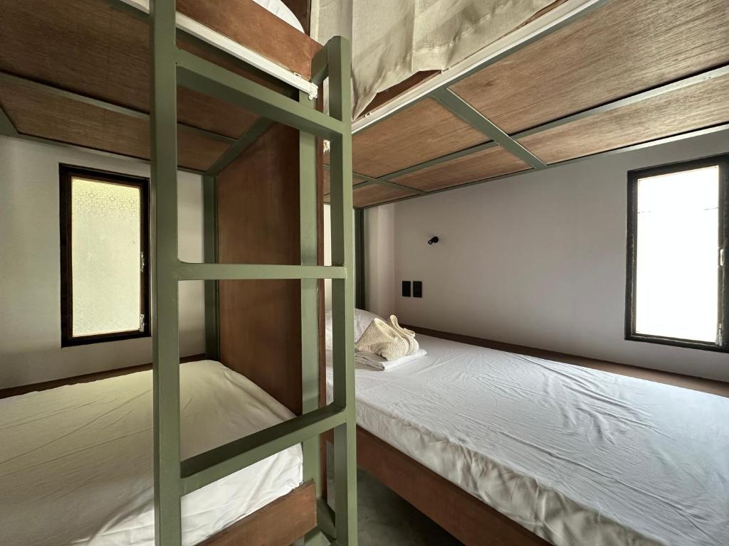 Letto o letti in una camera di Alpas Siargao