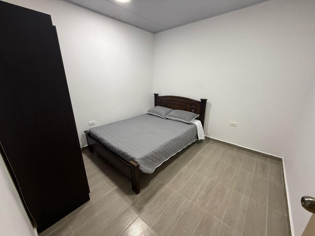 Voodi või voodid majutusasutuse Aparta hotel Brisas de salento toas