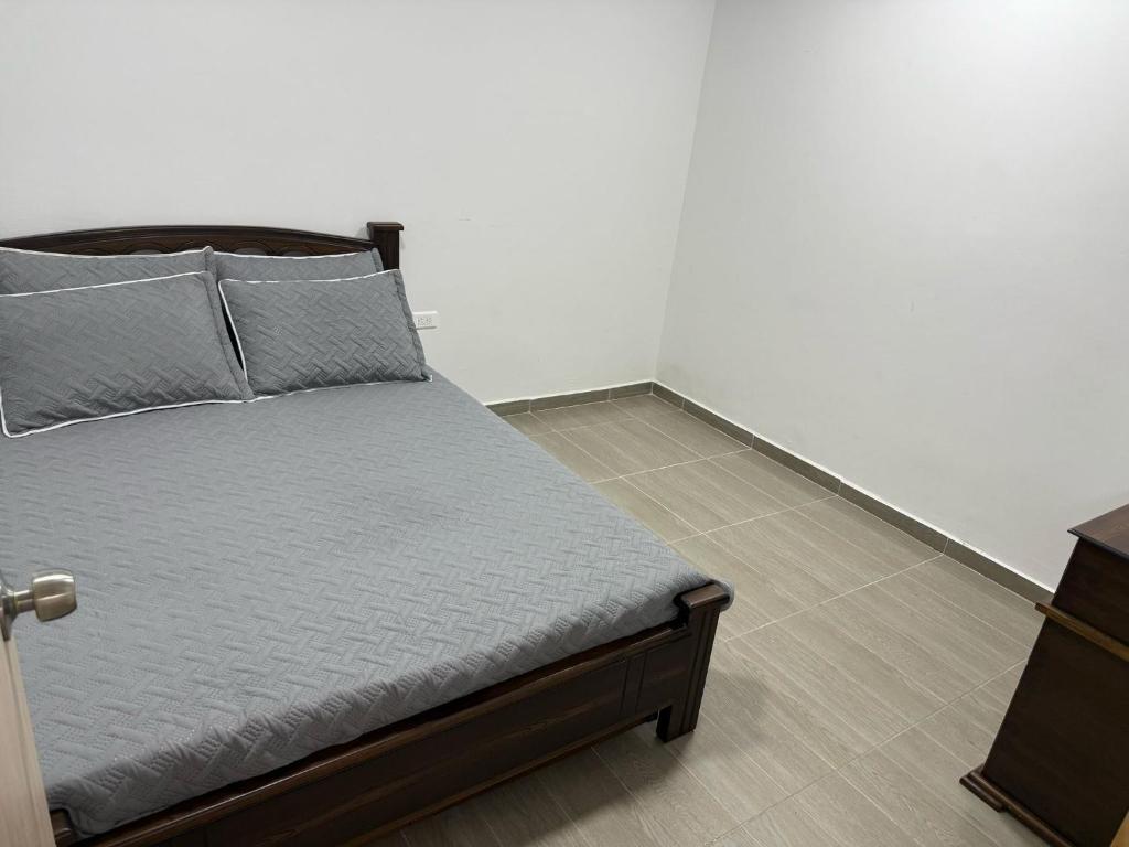 Voodi või voodid majutusasutuse Aparta hotel Brisas de salento toas