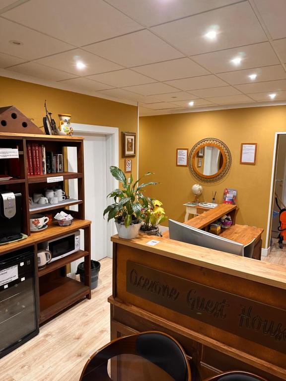 Un lugar para sentarse en Cicerone Guest House